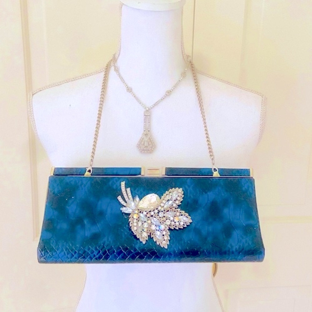 Iris Lane iridescent blue envelope clutch with crystal